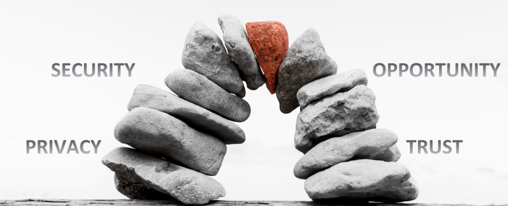 A greyscale bridge of rocks with a red keystone representing data awareness as the keystone of payment security